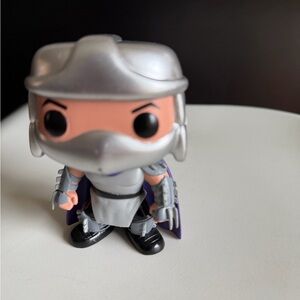 Silver and Black Vinyl Figure
